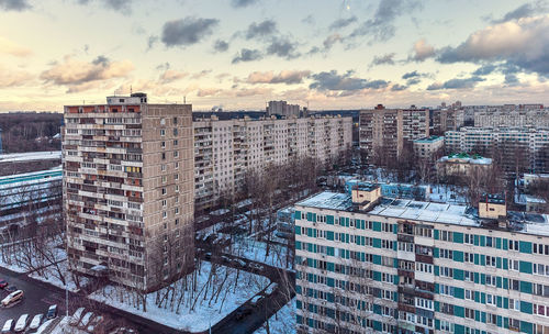 High angle view of buildings in city during winter