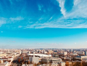 High angle view of townscape against blue sky