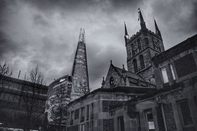 Low angle view of cathedral against cloudy sky