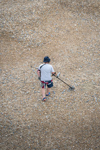 Rear view of man walking on street