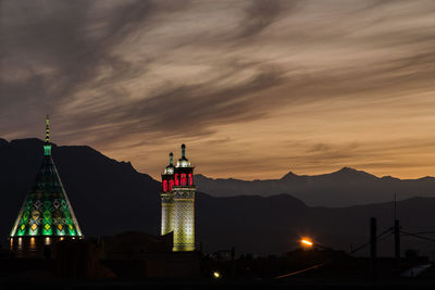 Built structure against sky at sunset