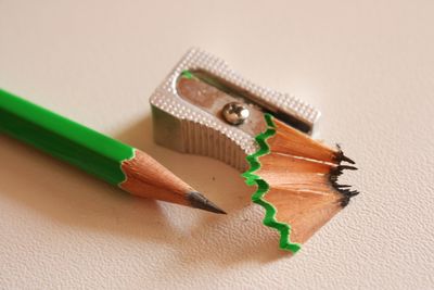 High angle view of pencil and sharpener on desk