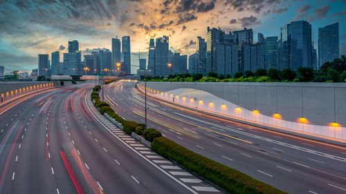 Singapore city highway traffic with movement of car light with singapore cityscape skyline