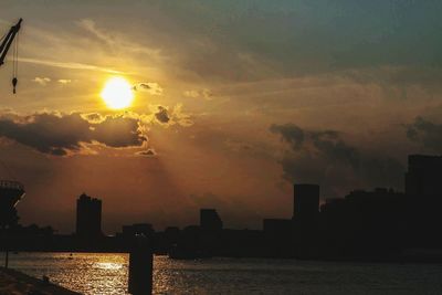 Dramatic sky over city during sunset