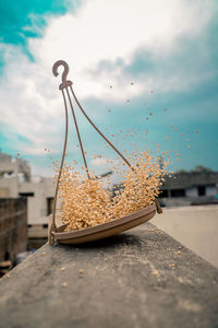 Close-up of food on table against sky