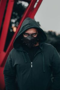 Portrait of man standing outdoors