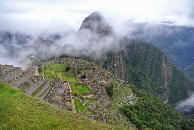 View of old ruins against cloudy sky. machu picchu. 