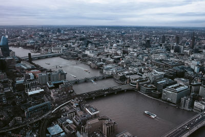 High angle view of river amidst buildings in city