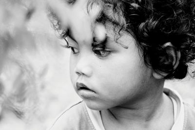 Close-up of young woman looking away