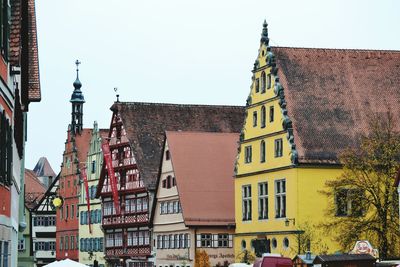 Low angle view of buildings against clear sky