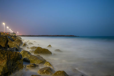 Scenic view of sea against clear sky