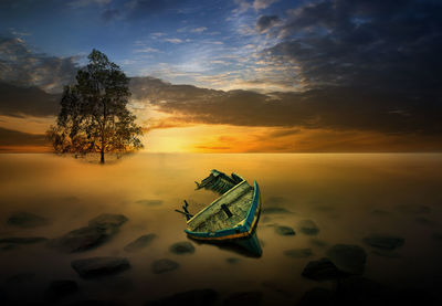 Scenic view of sea against sky during sunset