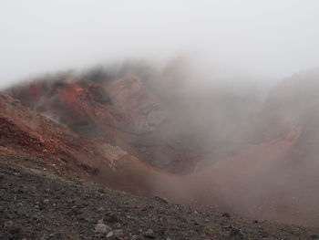 View of volcano in foggy weather