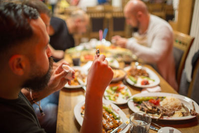 People eating food in restaurant