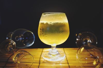 Close-up of beer glass on table