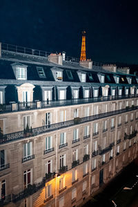 Buildings in city at night