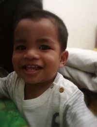 Portrait of cute boy smiling