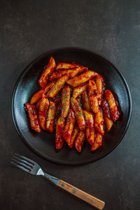 High angle view of meat in plate on table