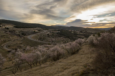 Scenic view of landscape against sky during sunset