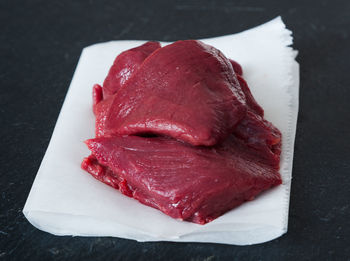 Close-up of meat on table