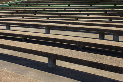 High angle view of bench on road