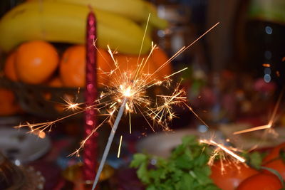 Close-up of firework display at night