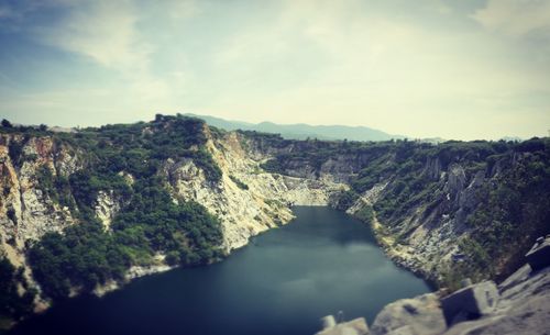 Scenic view of landscape and mountains against sky