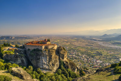 High angle view of town against sky during sunset