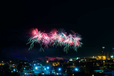 Sky illumed with fire crackers at night