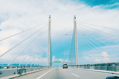 View of suspension bridge against sky