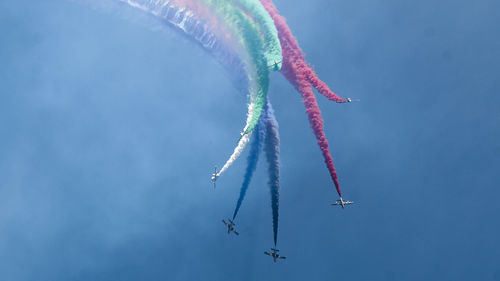 Low angle view of vapor trail