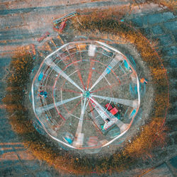 High angle view of amusement park ride moving outdoors