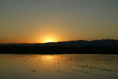 Scenic view of mountains at sunset