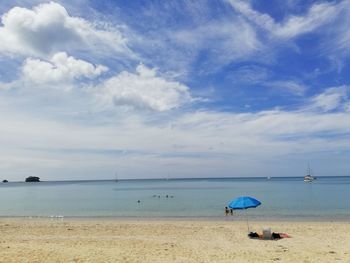 Scenic view of beach against sky