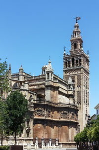 Low angle view of building against blue sky