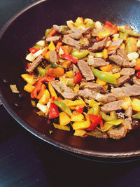 Close-up of chopped vegetables in cooking pan