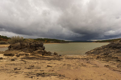 Scenic view of beach against sky