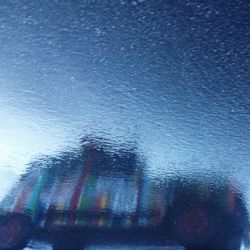 Close-up of water against blue sky