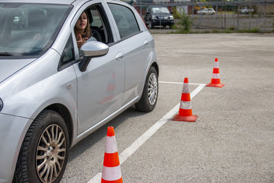 Driving school or test. training parking. how to drive and park car between cones.