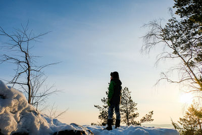 А severe hiker walking along the mountain path route. the urals landsc