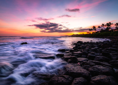 Scenic view of sea against sky during sunset