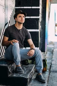 Portrait of man sitting outdoors