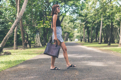 Full length of woman walking in park