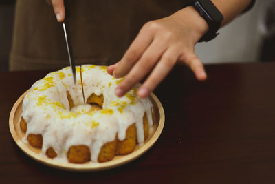 Midsection of person preparing food