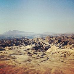 Scenic view of rock formations against clear sky