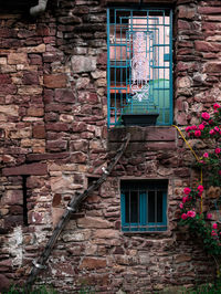 Blue windows on old building