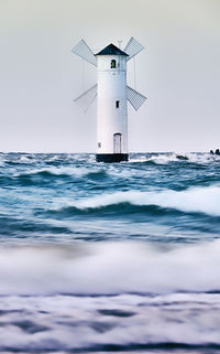 View of lighthouse in sea