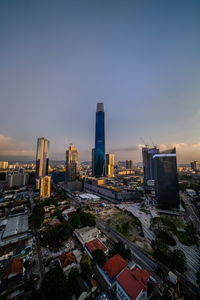 Cityscape against sky during sunset
