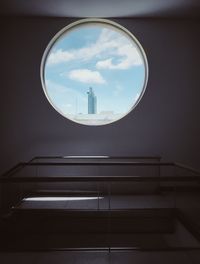 Low angle view of sky seen through glass window