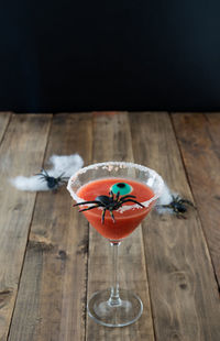 Close-up of wine in glass on table